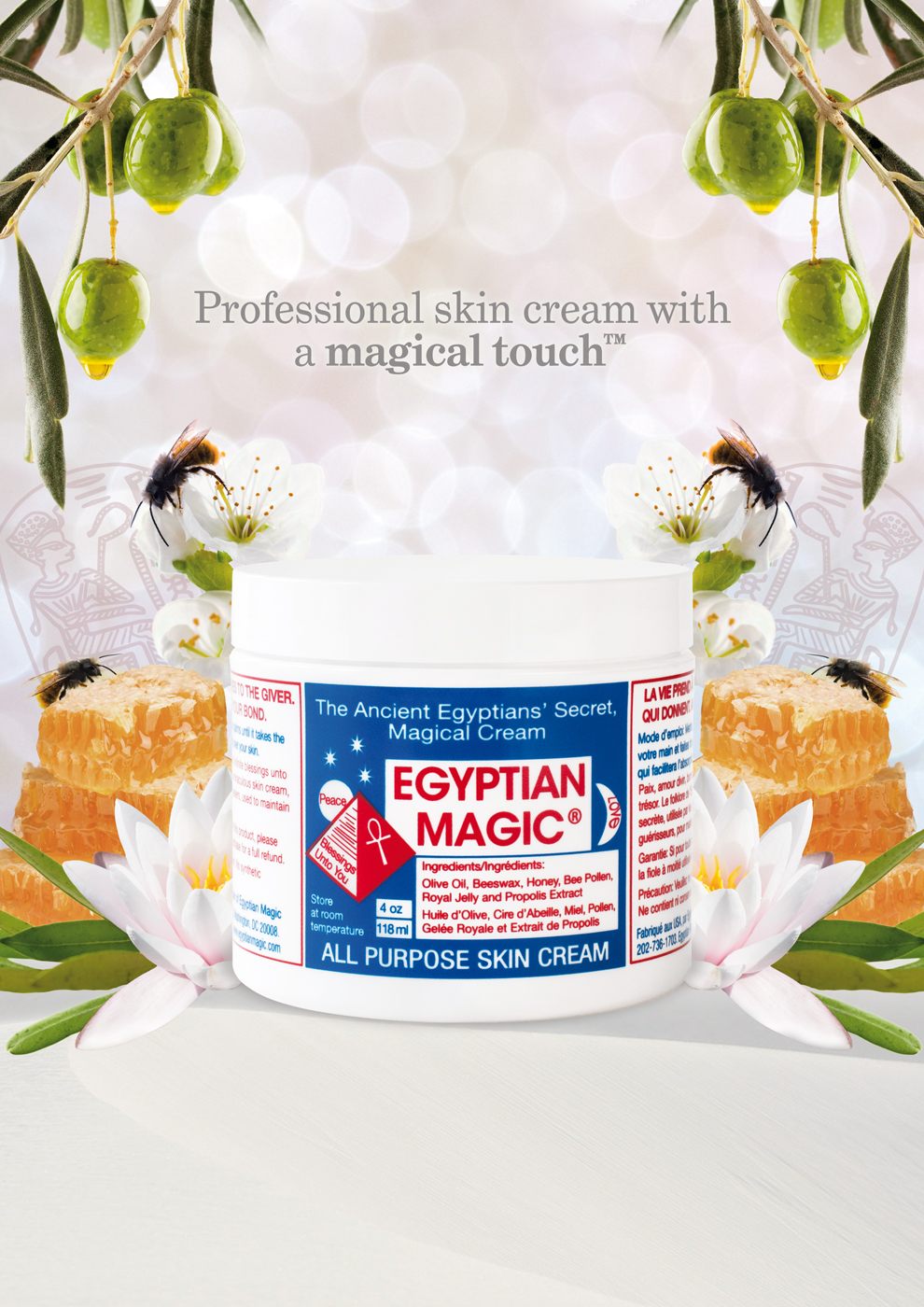 Egyptian Magic All Purpose Skin Cream, umgeben von Olivenzweigen, Bienen, Honigwaben und Lotusblüten