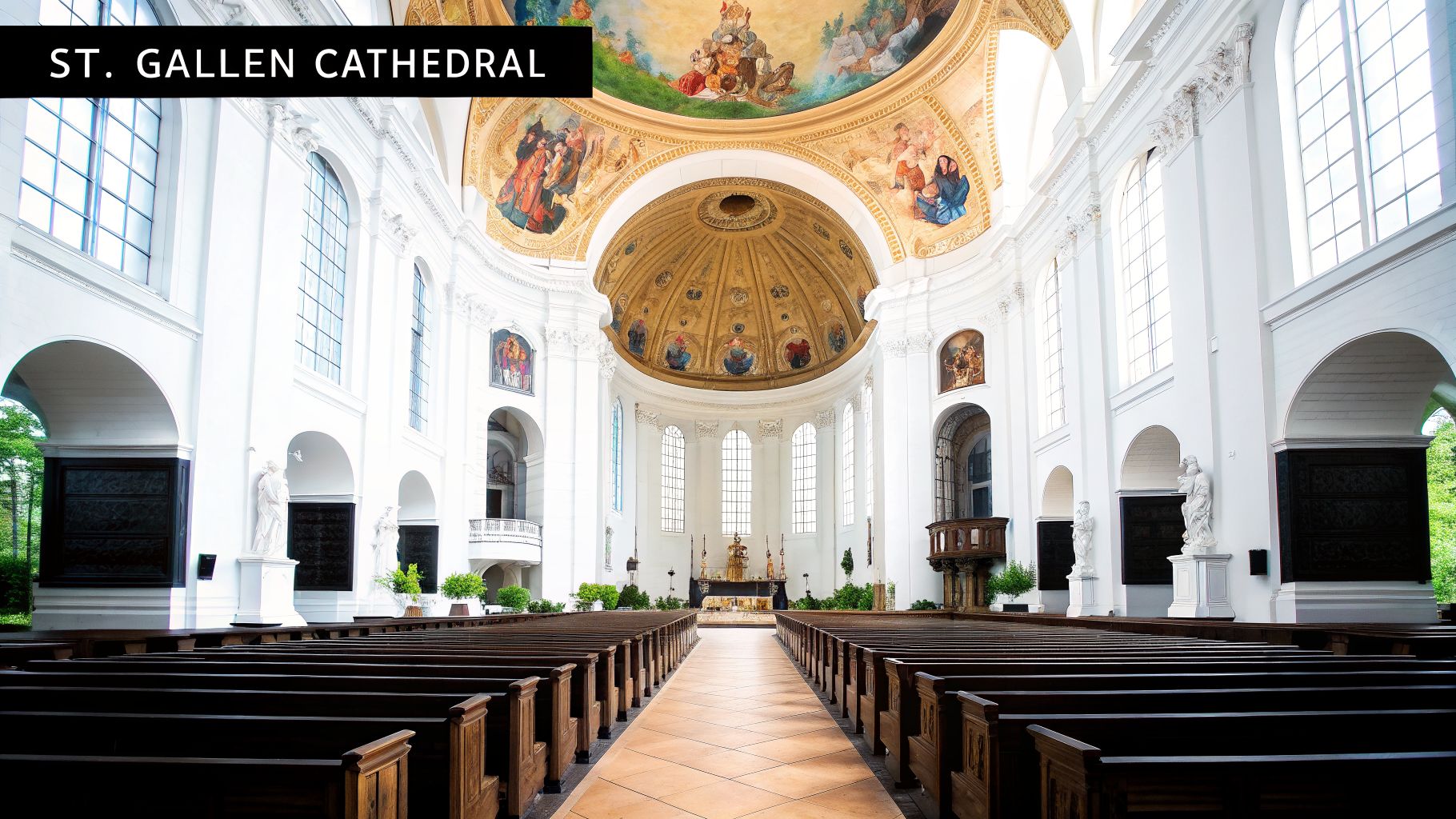The grand interior of St. Gallen Cathedral with an ornate dome, frescoes, and rows of empty pews.