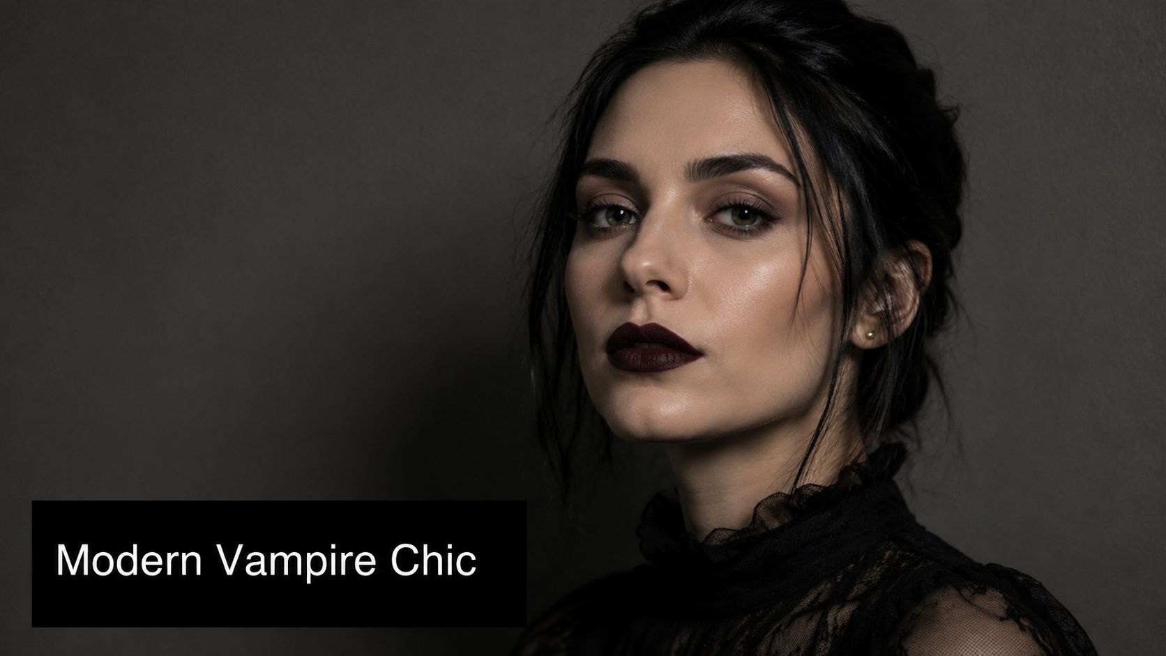 A young woman with dark hair wearing deep burgundy lipstick and a black lace top for Halloween.