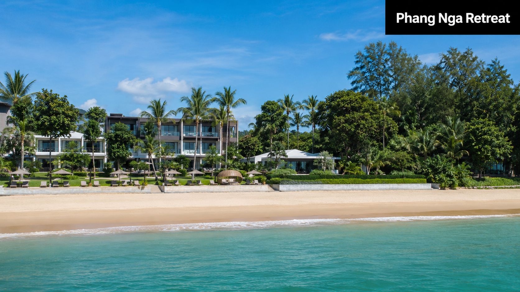 A luxurious beach resort in Phang Nga, Thailand, featuring modern architecture, lush greenery, and sandy shores.